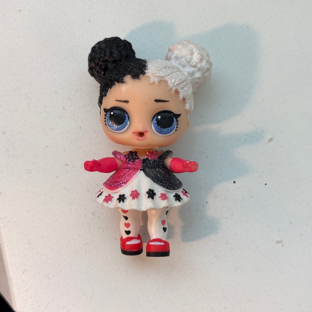 L.O.L. Surprise! Doll with Black, White, and Pink Outfit